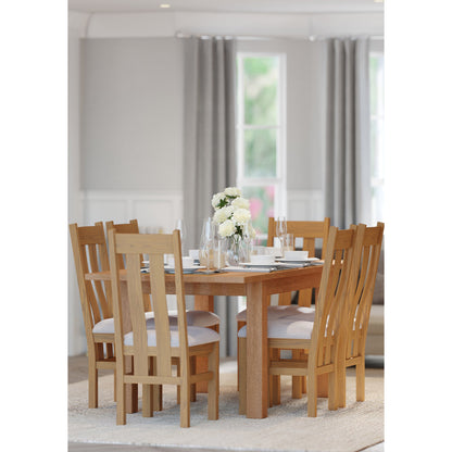 Braemar 4-6 Seater Medium Extending Dining Table Oak extended with Braemar River Dining Chair Ash end view