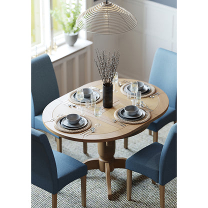 Braemar 4 Seater Round Extending Dining Table Oak extended with Inver Dining Chair above view