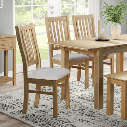 Stowe Dining Chair Oak Beige Fabric in dining space